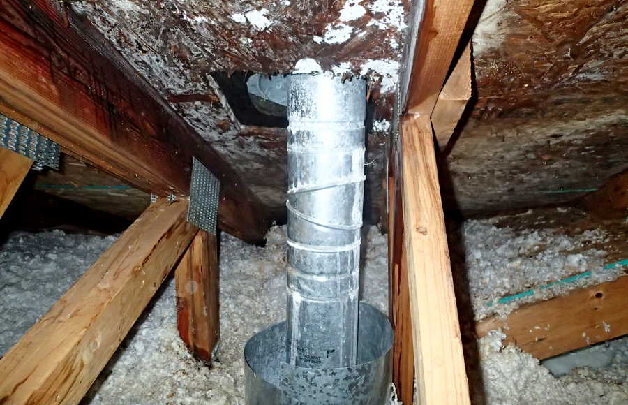 Disconnected duct in attic with mold growth. 
