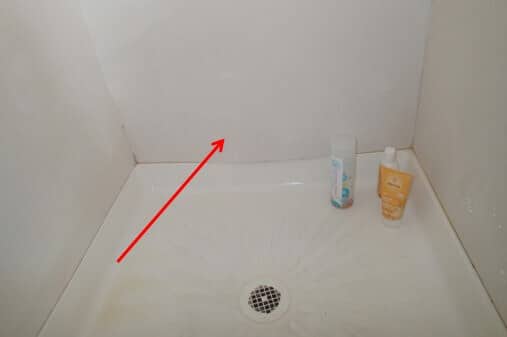 Back wall is bulging in shower from high humidity and water intrusion