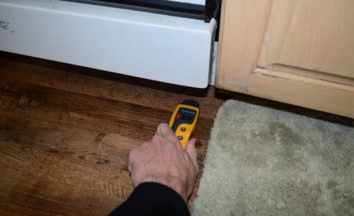 Elevated Moisture Noted In Flooring In Front of Dishwasher