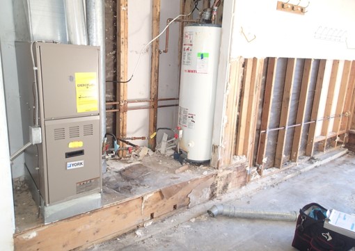 Mold growth found in water heater bump out in garage