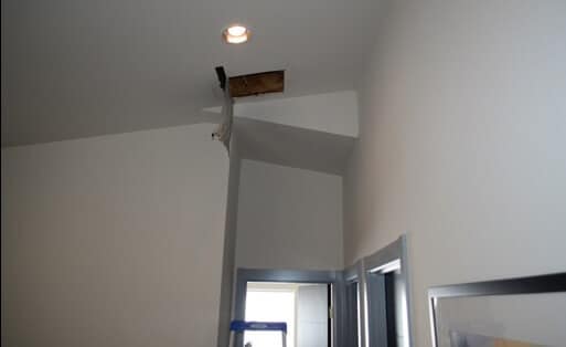 Access Hole Cut Into the Ceiling of Upstairs Hall