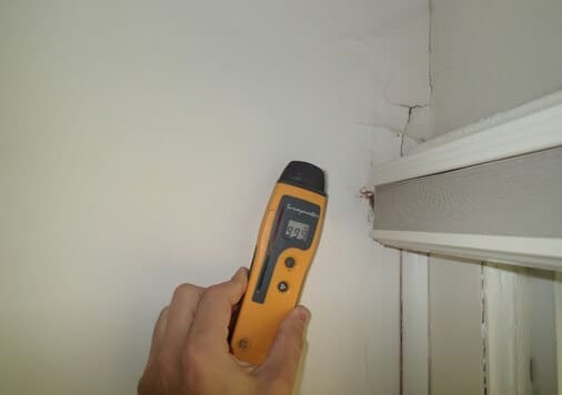 Wall in master bedroom has been affected by above roof leak