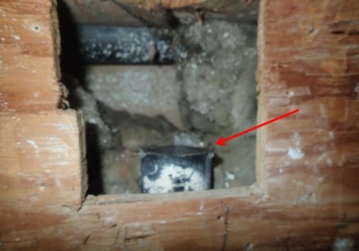 Exposed waste line.