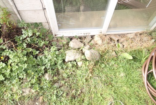 Saturated soil creates pressure and pushes vapor through cracks in the slab