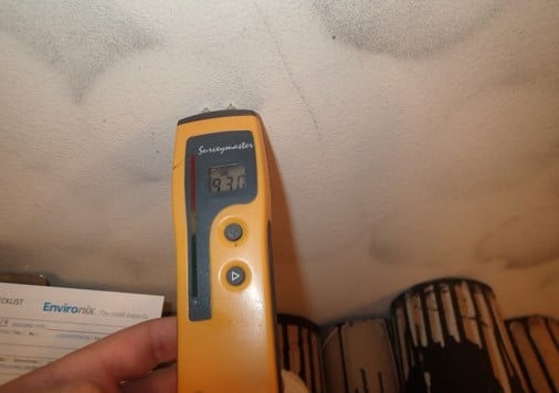 Wine cellar wall is wet from above leak