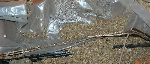 Attic condensation beneath vapor barrier