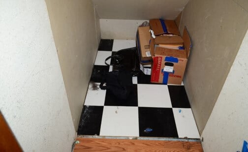 Water Damage Extends Into Under-Stair Closet