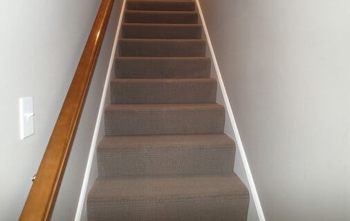 Stairwell that has no vapor barrier under it in the crawl space. this may be allowing odors from the crawl space to infiltrate to the interior of the home.