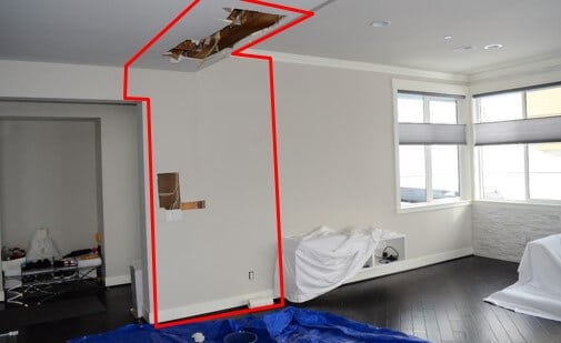 Damage to wall is outlined in red